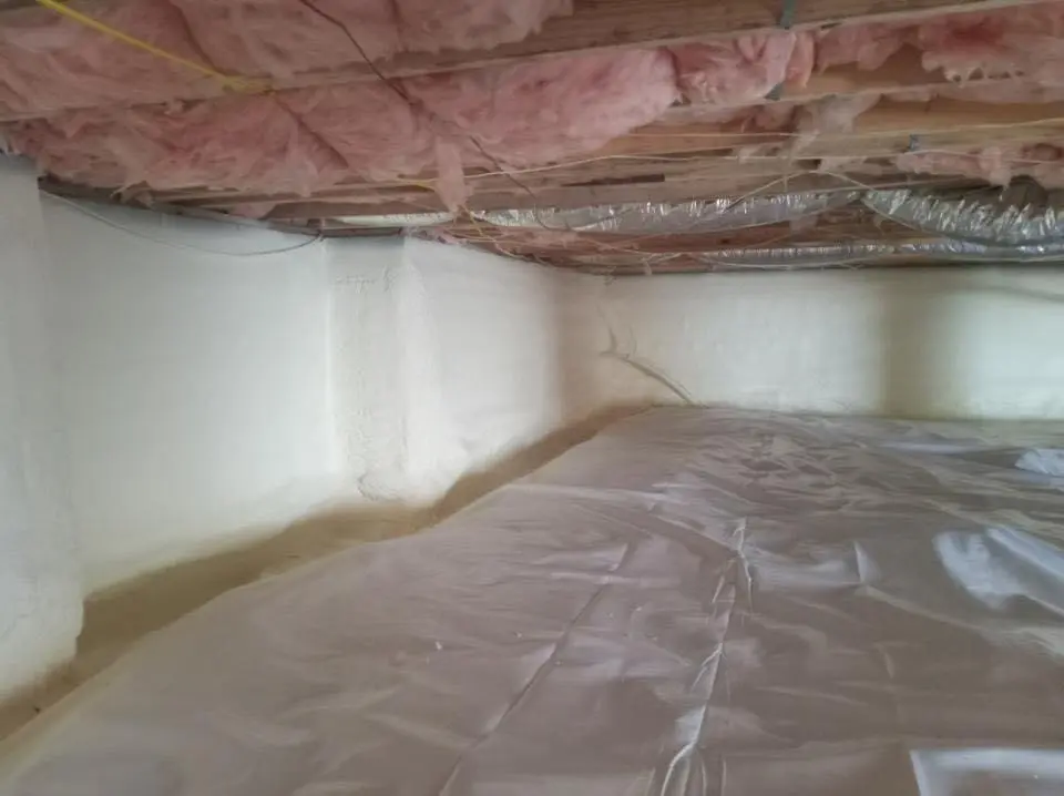 Crawl space encapsulation with closed-cell spray foam for Commercial Roof Restoration in Roswell